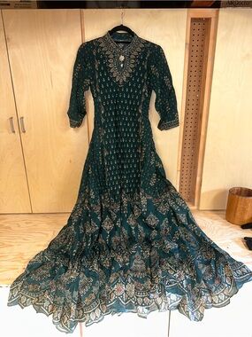 Elegant Dark Green Printed Maxi Dress with Gold Accents